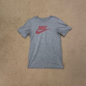 Grey Nike T-Shirt with a red swoosh size youth large